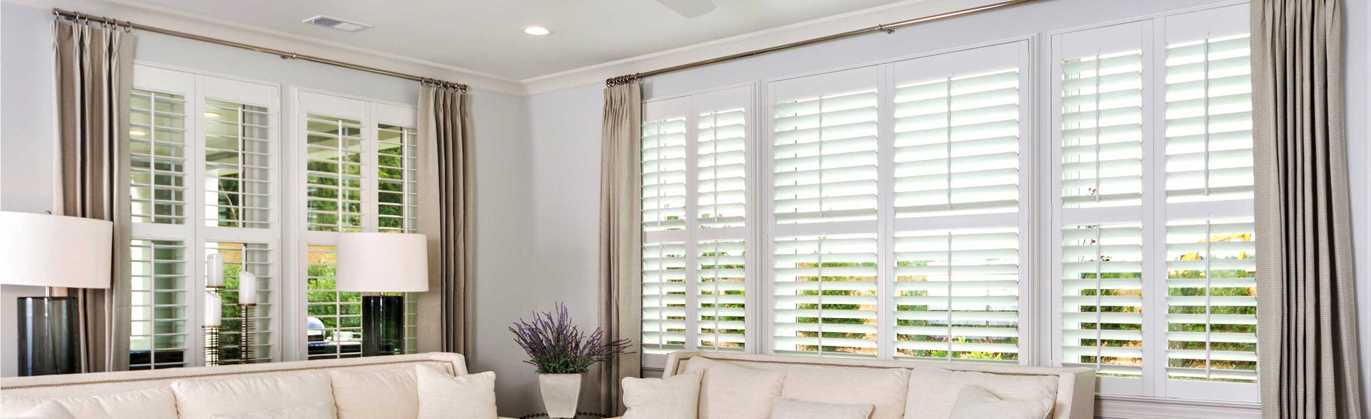 White painted shutters in a living room.